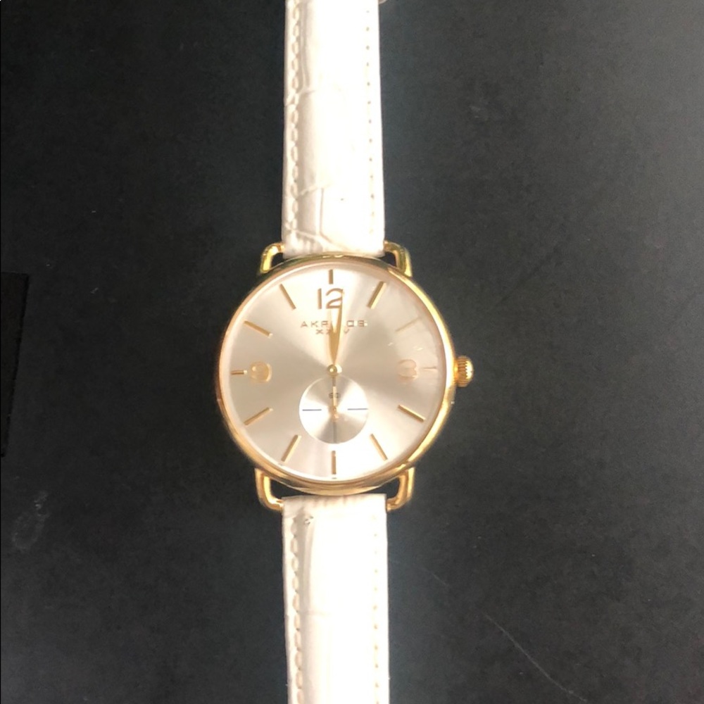 Akribos white leather band, mother of pearl & gold